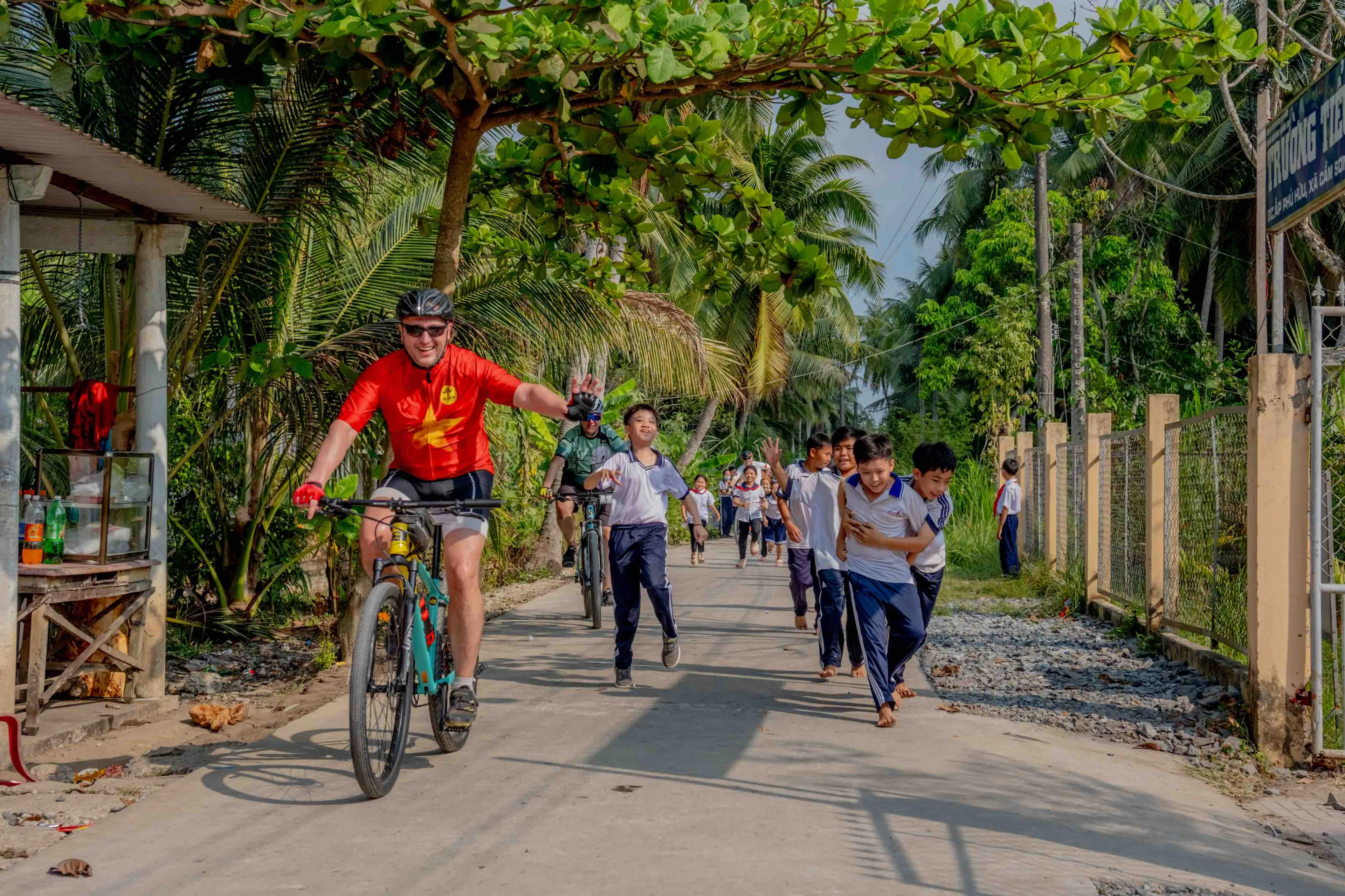 Mr Biker Saigon, Cycling Indochina: Vietnam to Cambodia Adventure Trip, Passing a Local School