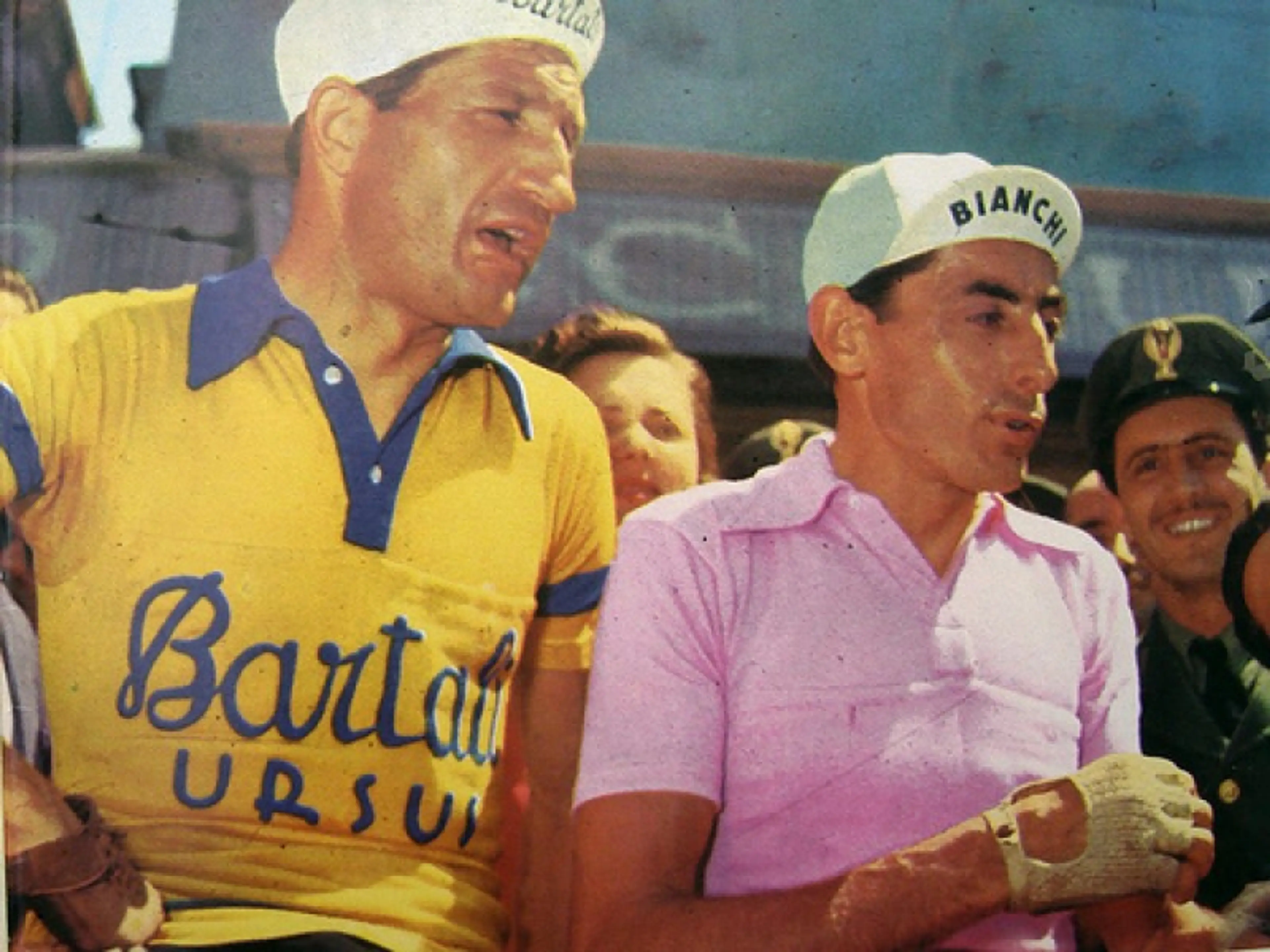 Bartali (left) and Coppi (in pink jersey) in a break in the Giro d'Italia between the 1940s and 1950s