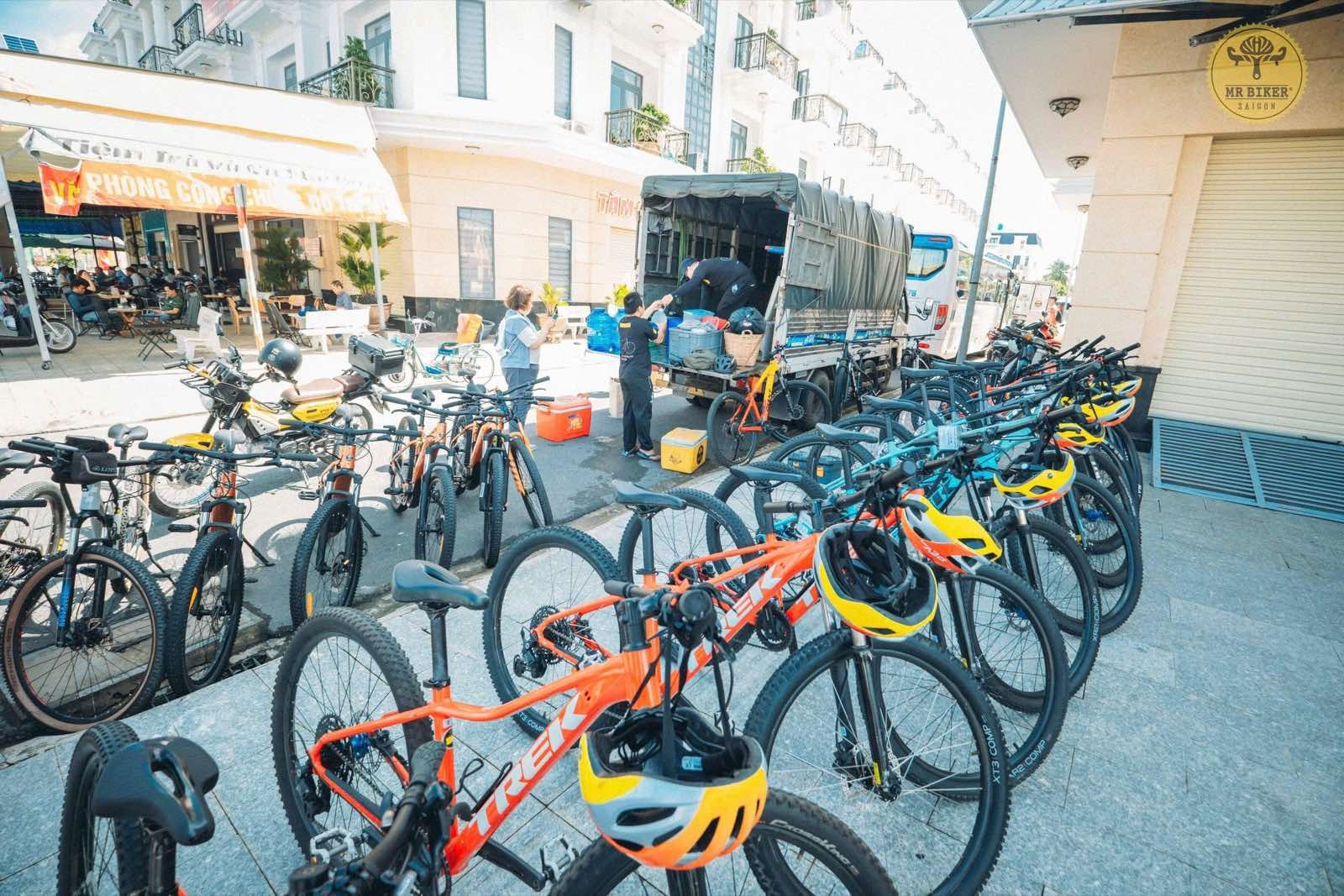 Mountain bike fleet lined up outside Mr Biker Saigon before a tour departure